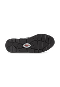 Semelle de chaussure noire avec un motif de traction texturé, présentant un logo ovale central. Le matériau semble être du caoutchouc avec des rainures profondes pour une meilleure adhérence.