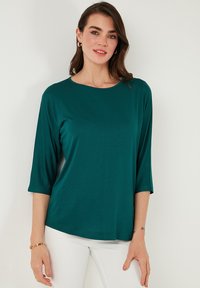 Long sleeved top - dark green melange