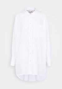 Hvid langærmet skjorte med knapper, lavet af let stof, med spids krave, en enkelt brystlomme og en buet kant.