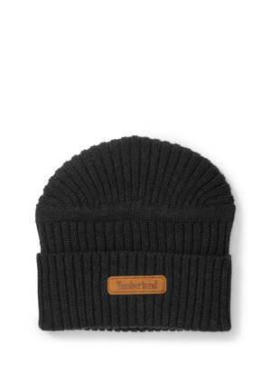Berretto a coste nero in maglia con risvolto e toppa in pelle marrone con marchio Timberland al centro davanti.