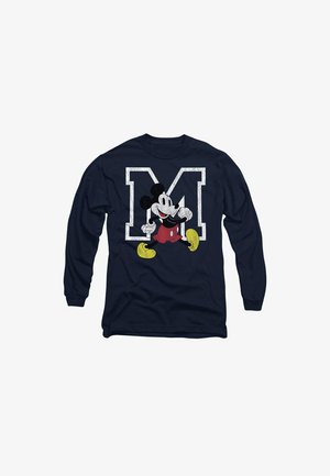 Navy long-sleeve shirt featuring a vintage Mickey Mouse graphic in red shorts and yellow shoes against a white letter "M." Soft cotton fabric.