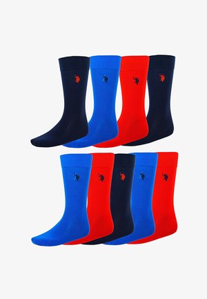 Otte strømper til fine anledninger i marineblå, klar blå og rød, hver med et lille broderet polo-spillerlogo tæt ved kanten.