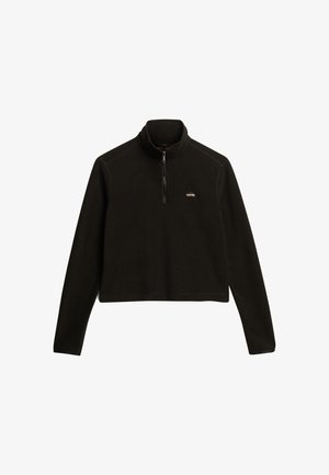 Pulóver de forro polar negro con un cuello alto, cierre de media cremallera y mangas largas. Presenta un pequeño logo en el pecho y un diseño cropped.