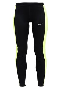 Leggings de sport noirs avec des rayures latérales jaune fluo, arborant une texture lisse, un design ajusté et un petit logo réfléchissant Nike.