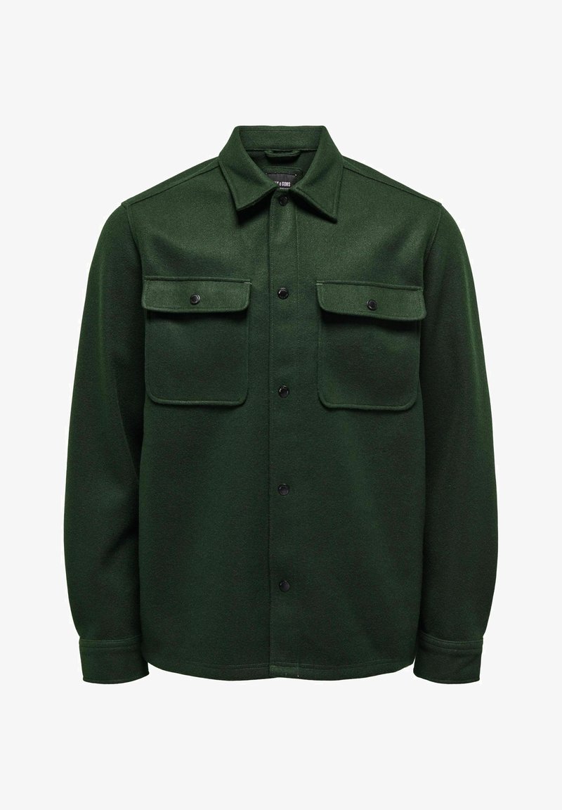 Groene wollen shirtjas met een kraag, twee voorste klepzakken, sluiting met knopen aan de voorkant en lange mouwen met knoopmanchetten.