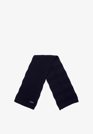 Écharpe tricotée bleu marine avec un motif en ribbing texturé et un patch logo, fabriquée en tissu doux pour la chaleur et le confort.