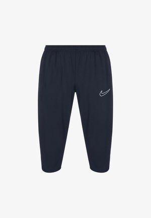 Granatowe spodenki sportowe z elastycznym paskiem w talii, z białym logo Nike na lewej udzie. Gładki materiał i długość do kolan.