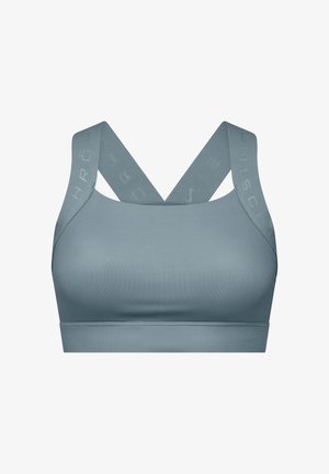 Vaaleansininen urheiluliivi ristikkäisillä selkähihnoilla. Valmistettu sileästä kankaasta, jossa logo hihnoissa. Saumaton malli ilman toppausta.