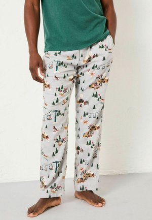 Comfortable gray pajama pants featuring a ski-themed pattern with trees, snowboards, and cabins. Drawstring waistband, relaxed fit.