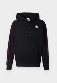 Sudadera con capucha negra y franjas laterales rojas, logo en el pecho, bolsillo delantero y dobladillos y puños acanalados. Fabricada en un tejido suave y texturizado.