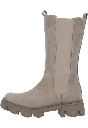 Mid-calf taupe suede boot with chunky treaded sole, elastic side panels, and pull tabs at top, designed for casual or outdoor wear.