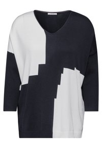 Dunkelblauer und weißer Pullover mit V-Ausschnitt, der ein geometrisches Farbblockdesign, ¾-Ärmel und einen weichen, strukturierten Strickstoff aufweist.