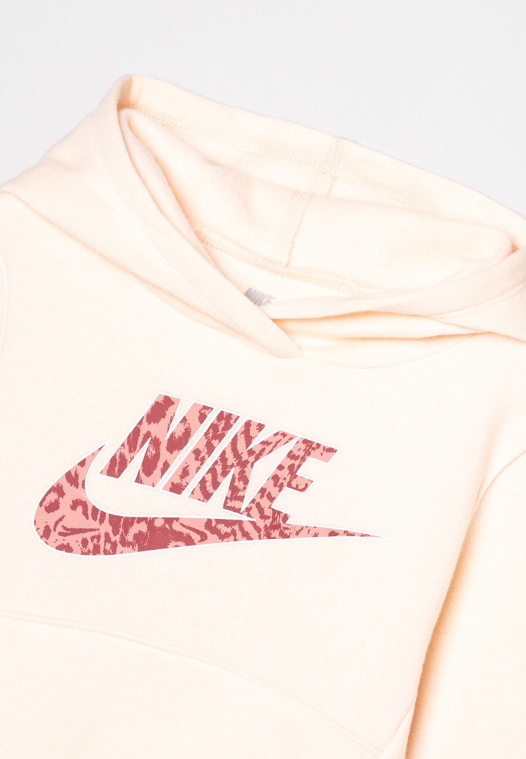 Felpa Nike color pesco con un grande logo a stampa animale rosa. Presenta una tasca a marsupio frontale e un cappuccio con cordino. Tessuto in misto cotone.