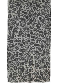 Écharpe légère ornée d'un motif floral dans des nuances de gris sur fond blanc, avec des bords effilochés et une finition douce et texturée.