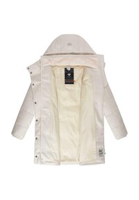 Veste d'extérieur beige clair avec capuche, texture matelassée, fermeture à pression à l'avant et doublure lisse de couleur crème. Étiquette intérieure visible.