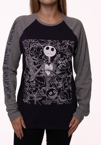 Long-sleeve shirt featuring a navy blue body and gray sleeves, adorned with white illustrations from "The Nightmare Before Christmas."