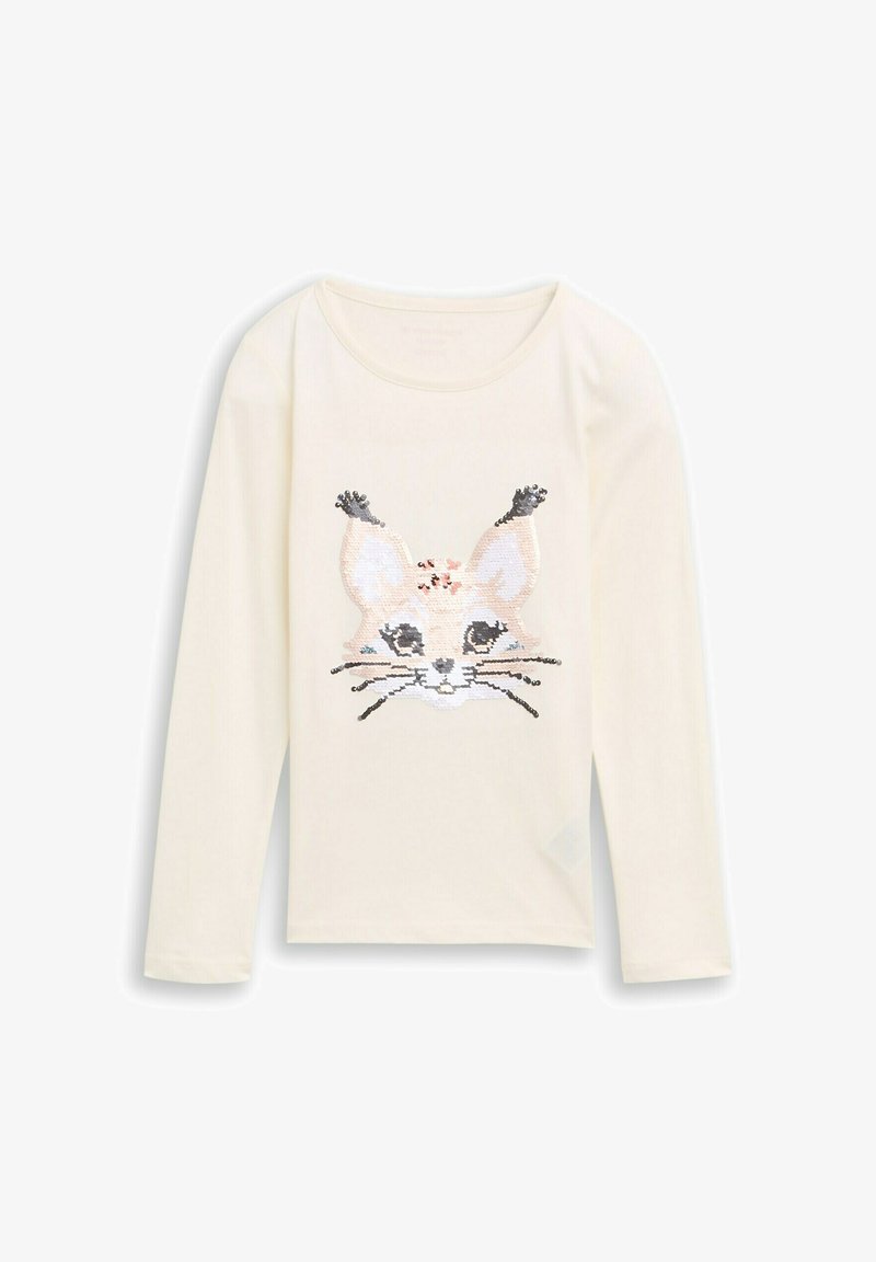 Crème lange mouwen shirt met een paillettenkat gezicht ontwerp in beige, zilver en zwart. Zacht materiaal met een ronde halslijn.