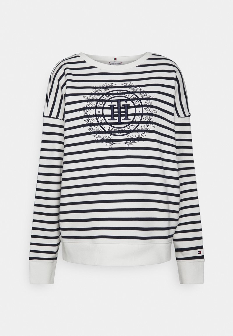 Sweatshirt à rayures en blanc et bleu marine, avec un graphique de logo au centre, des poignets côtelés et une coupe décontractée. Matière en coton doux.