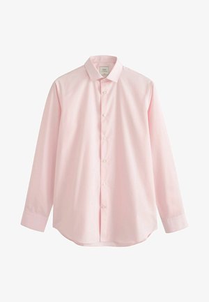 Long-sleeve shirt in light pink cotton with a pointed collar, front button closure, and rounded hemline. Smooth texture and tailored fit.