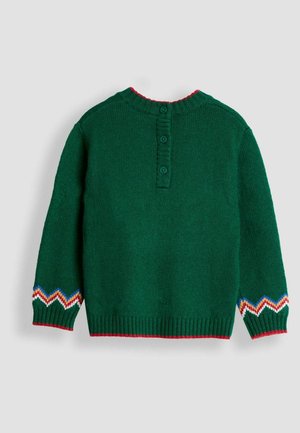 Grüner Strickpullover mit Knöpfen am Rücken, geripptem Saum und bunten Zickzack-Details an den Ärmeln, ergänzt durch roten Saum am Kragen.