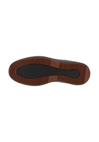 Suola di scarpa in gomma nera con superficie testurizzata, caratterizzata da una sezione marrone a motivo e scanalature orizzontali per la trazione.