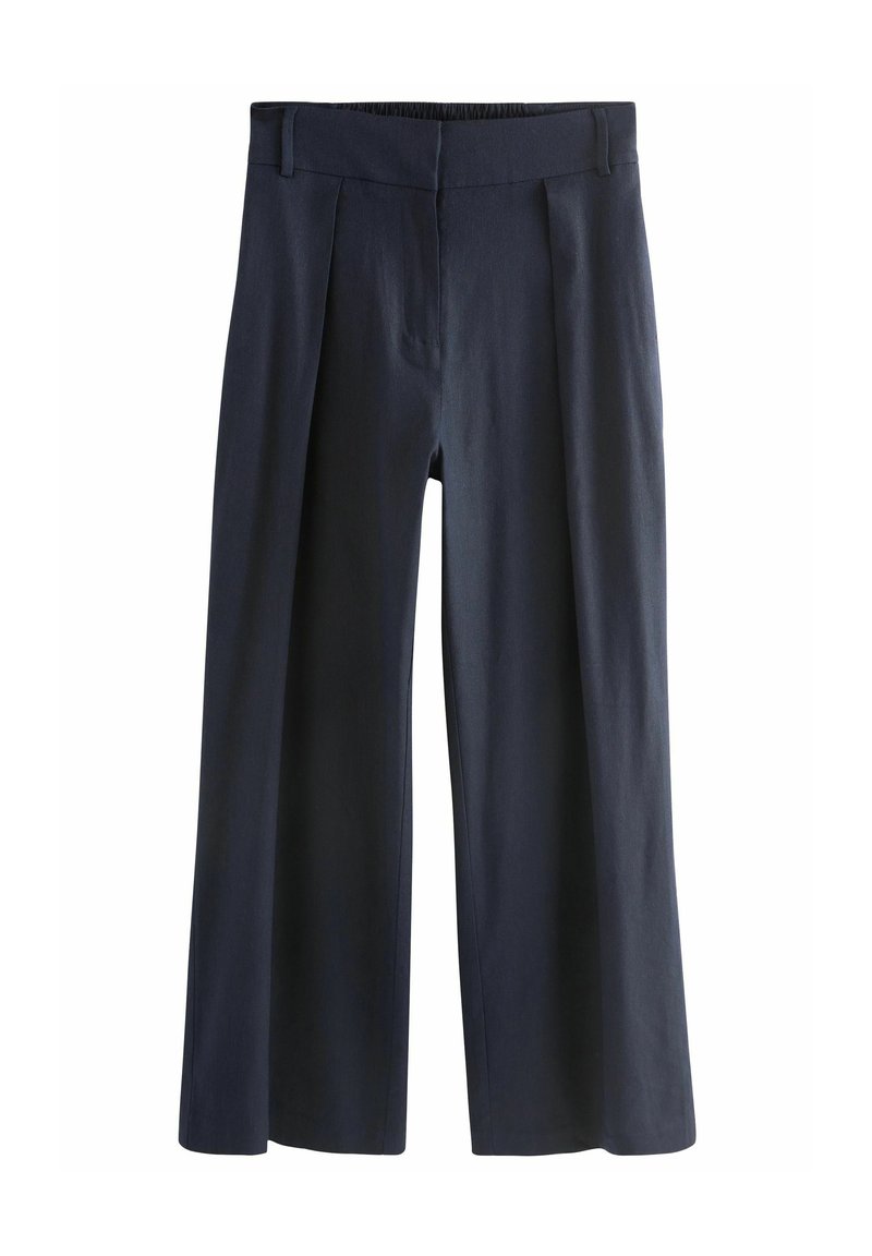 Marineblauwe wijde broek met een hoge taille, plooien aan de voorzijde en een gladde textuur. De elastische tailleband biedt flexibiliteit voor een comfortabele pasvorm.