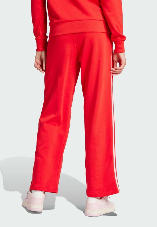 ESSENTIALS COLOR POP - Tracksuit bottoms - pure ruby4