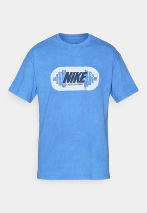 Blue cotton t-shirt featuring a central graphic with "NIKE" and "ATHLETIC DEPARTMENT" in black, surrounded by weights. Casual design.