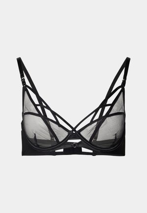 Soutien-gorge en maille noire avec un design structuré, des bretelles croisées et des accents en métal. Texture lisse avec des panneaux transparents.