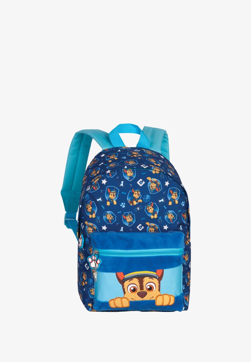 Sac à dos bleu pour enfants avec motif de chien de dessin animé et grande poche avant présentant le visage d'un chien qui dépasse du bord.
