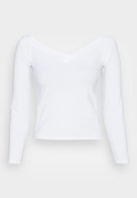 Vit långärmad skjorta med djup V-urringning, tillverkad av ett mjukt, elastiskt tyg. Har en figurnära design och enkel silhuett.