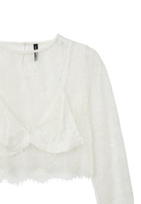 Weißes Spitzentop mit langen Ärmeln, einem cropped Design, V-Ausschnitt und einer weichen Textur mit floralen Mustern. Knopfverschluss auf der Rückseite.