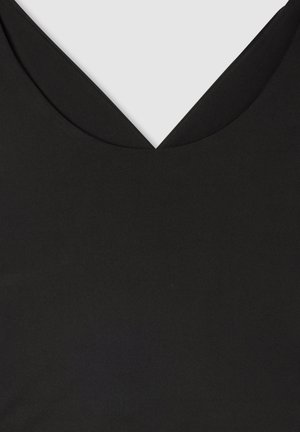 Top nero senza maniche con una profonda scollatura a V, realizzato in un tessuto liscio senza motivi o decorazioni visibili.