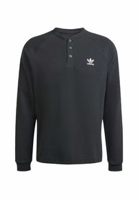 Black long-sleeve henley shirt with a textured fabric, three-button placket, and a white Adidas logo on the left chest.