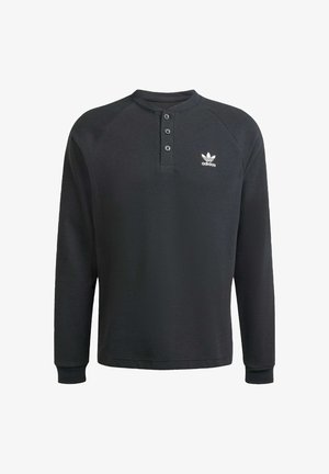 Czarna long-sleeve koszulka henley z teksturowanej tkaniny, z trzema guzikami i białym logo Adidas po lewej stronie klatki piersiowej.