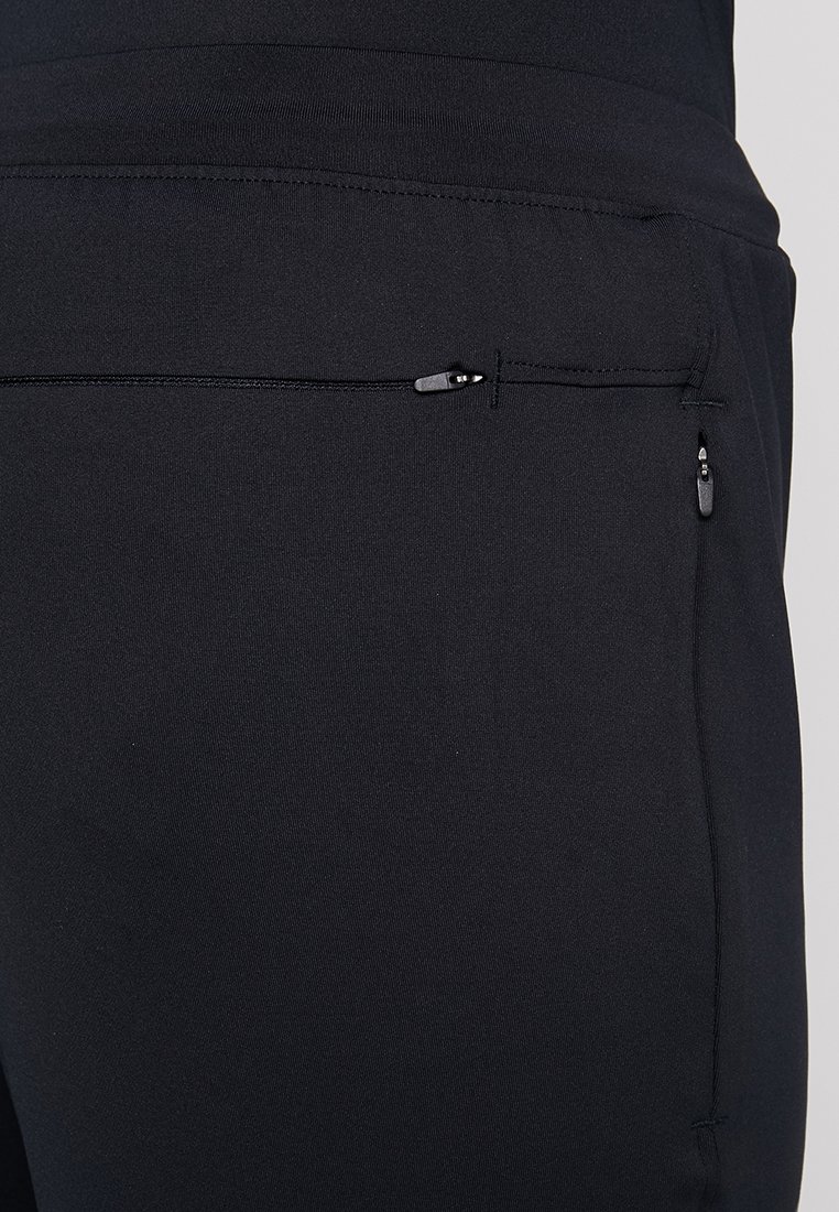 Herren Sportbekleidung | Under Armour RUSH ENGANLIEGEND Jogginghose black/schwarz - PK27492 Herren Sportbekleidung | Under Armour RUSH ENGANLIEGEND Jogginghose black/schwarz - PK27492