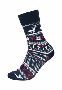 Calze blu navy con un motivo invernale che presenta renne bianche, fiocchi di neve rossi e bianchi, e design geometrici. Tessuto morbido e lavorato a maglia.