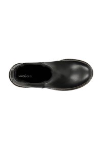 Černá kožená slip-on obuv s kulatou špičkou, elastickými bočními panely a jemnými švy. Vnitřek je z měkkého textilního podšívky.