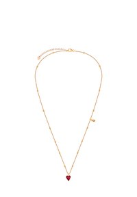 Złoty naszyjnik z delikatnym łańcuszkiem, z okrągłymi koralikami i czerwonym serduszkiem pośrodku. Regulowane zapięcie z małą metką.