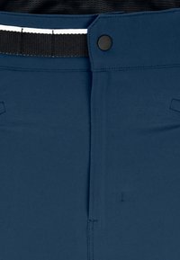 Navy blue trousers with a smooth texture, featuring a black elastic waistband, a single button closure, and two side pockets.