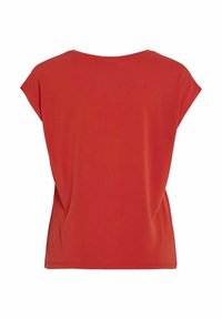 Top corto rojo de manga corta, hecho de una tela suave, con un escote redondeado y un diseño de corte suelto. Textura suave sin patrones adicionales.
