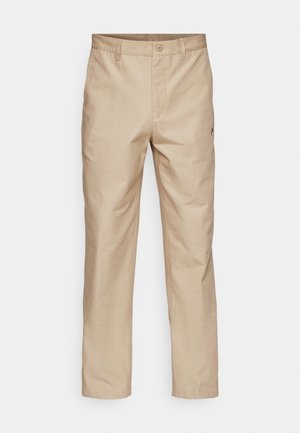 Beige színű, egyenes szabású pamut nadrág sima textúrával, övhurkokkal és egyetlen oldalsó zsebbel, melyen logó részlet található.