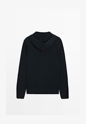 Mørkeblå hoodie med en afslappet pasform, der har en blød tekstur, en bred hætte og ribbede manchetter. Bagfra fremhæver designet det minimalistiske udtryk.