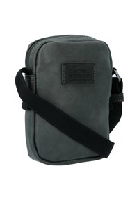 Gray leather crossbody bag with a zip closure, black strap, and a stitched logo patch; smooth texture and rectangular shape.