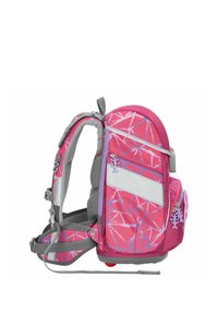 Pink and gray backpack with geometric patterns, padded straps, multiple zippered pockets, and a sturdy base with a wheel for mobility.