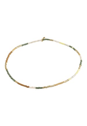 Cavigliera a forma di cuore aperto in oro 18 carati Cavigliera a forma di cuore aperto in oro 18 carati