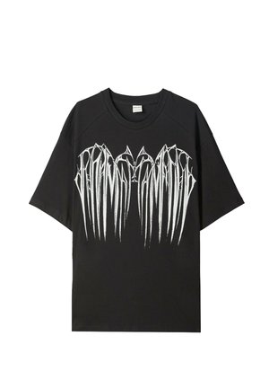 Black t-shirt featuring a large white graphic design resembling claw marks across the chest, with short sleeves and a crew neckline.