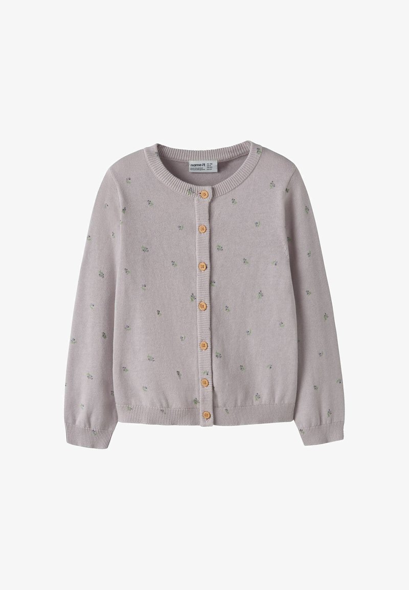 Helelilla kootud kardigan väikeste roheliste lillemustritega ja puidust nööpidega keskel, millel on soonilised mansetid ja alumine äär.