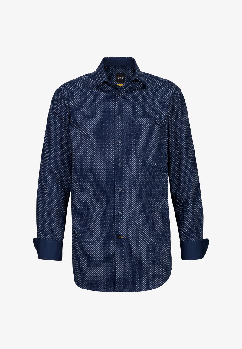 Camicia a maniche lunghe blu navy con piccoli pois bianchi, chiusura a bottoni e polsini a contrasto. Presenta una tasca sul petto e un orlo curvo.