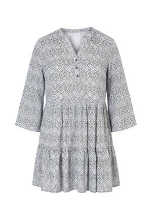 Grå tunika kjole med hvidt blomster-geometrisk mønster, trekvartærmer, lagdelt nederdel og en V-hals med tre knapper.